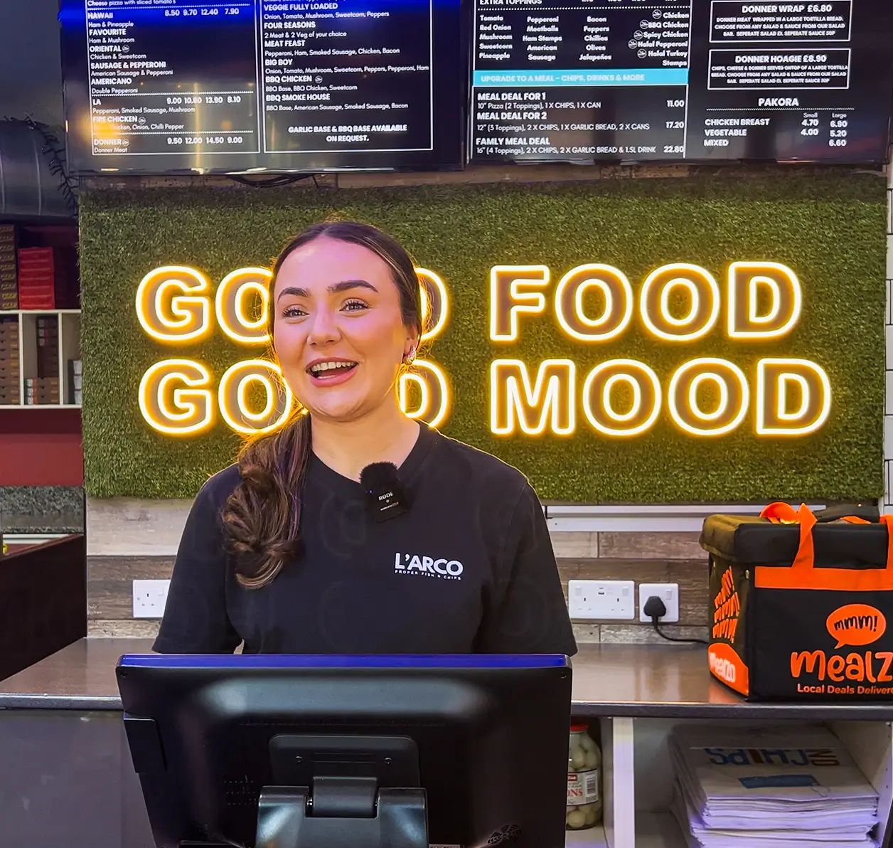 Staff using the Mealzo all-in-one EPOS system at the counter