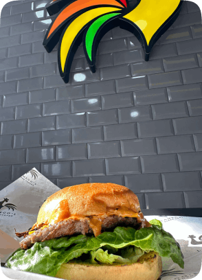 Fresh burger ready for delivery by Lamegos Takeaway