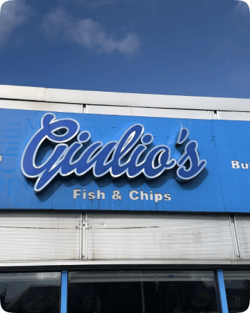 The sign of Giulio's fish and chips takeaway in Falkirk